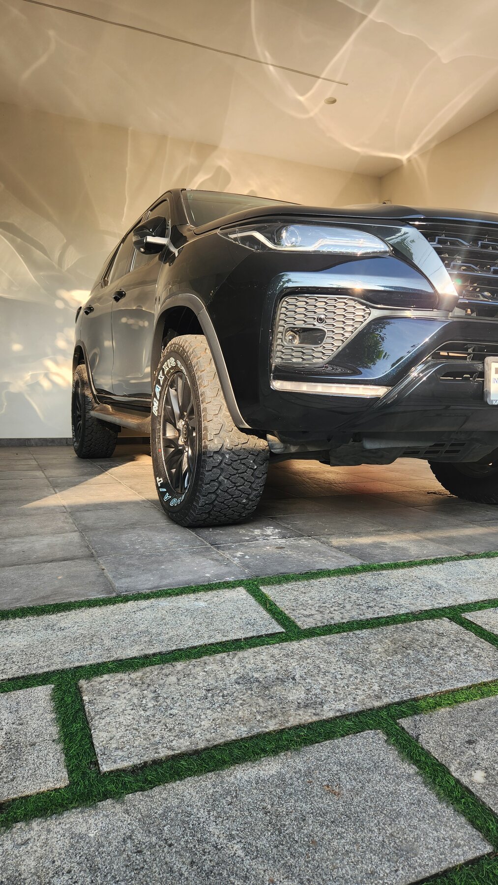The Toyota Fortuner parked in the driveway the evening before the trip