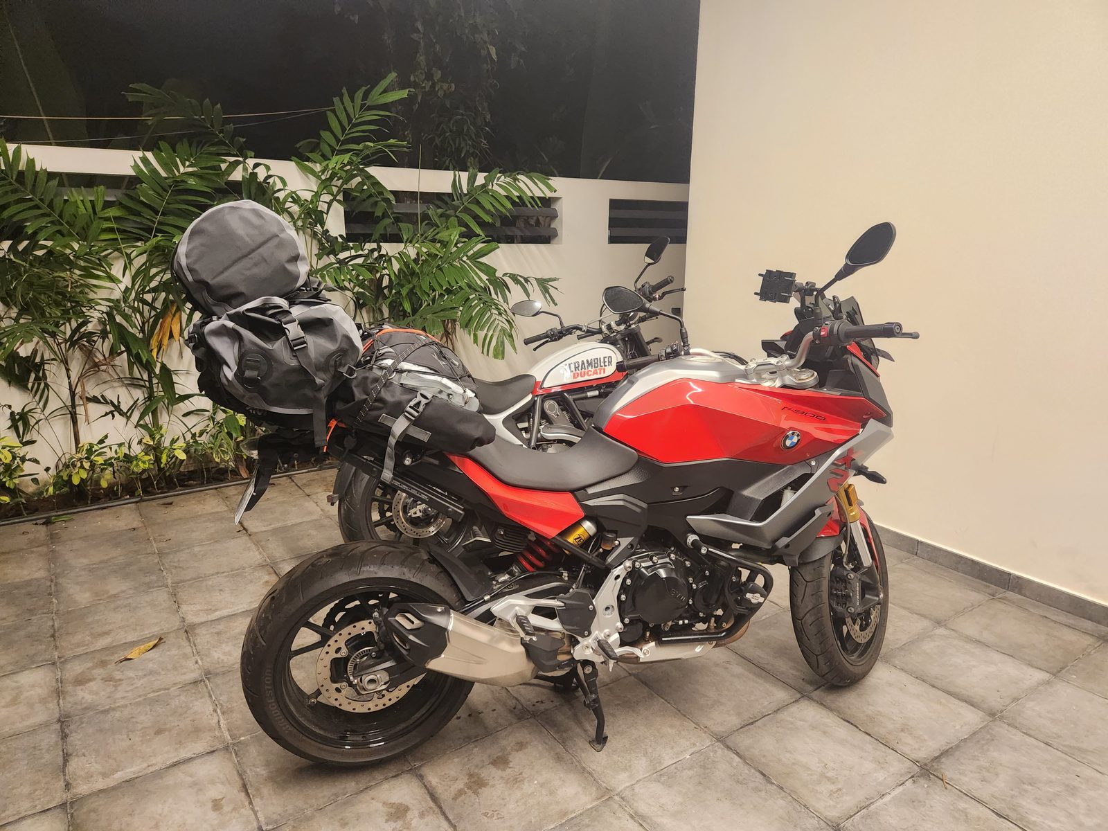 The BMW F900XR loaded and ready in the courtyard before dawn