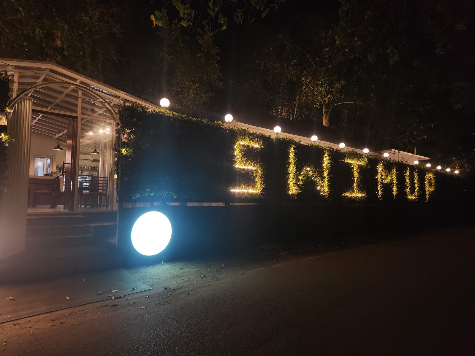 A restaurant in Goa, lit up at night