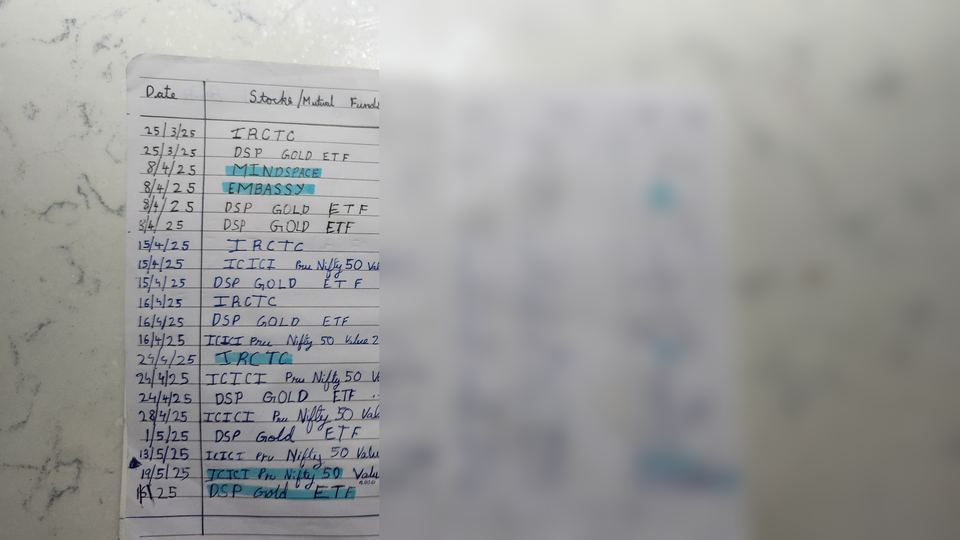A page from the second notebook — different handwriting, same column structure of date, stock or mutual fund name, units, NAV, total units, with numeric values blurred