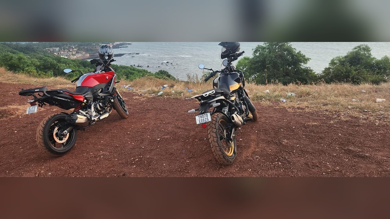 Two motorcycles at Vagator beach at sunset