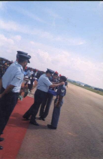 The Air Marshal pinning the gold medal on me on the red carpet at Jakkur airfield